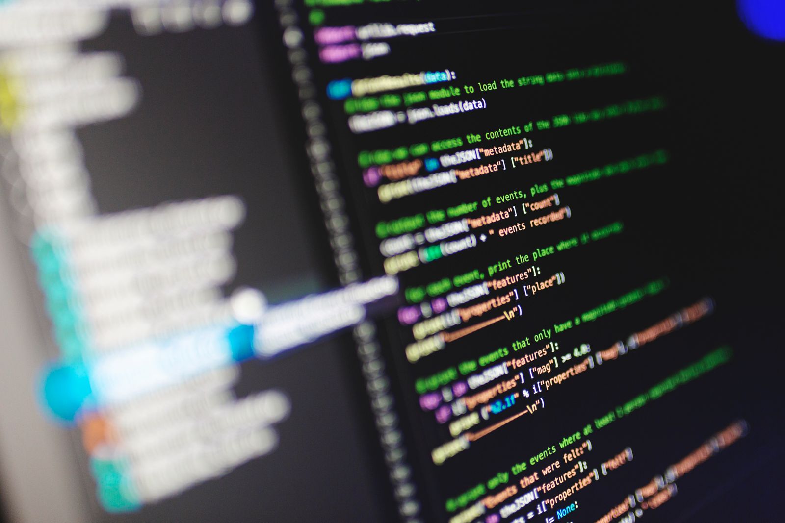 A monitor showing code that parses a JSON document and reads fields out of its metadata
